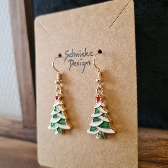 Earrings with a snow-covered Christmas tree
