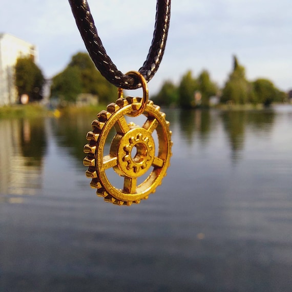 Black chain with golden gear