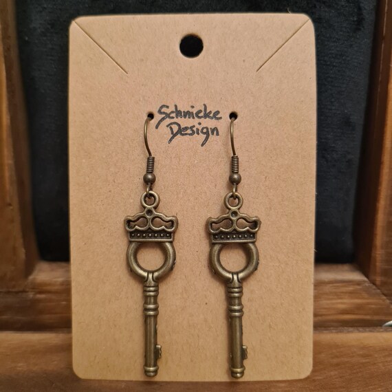 Earrings with keys in antique bronze