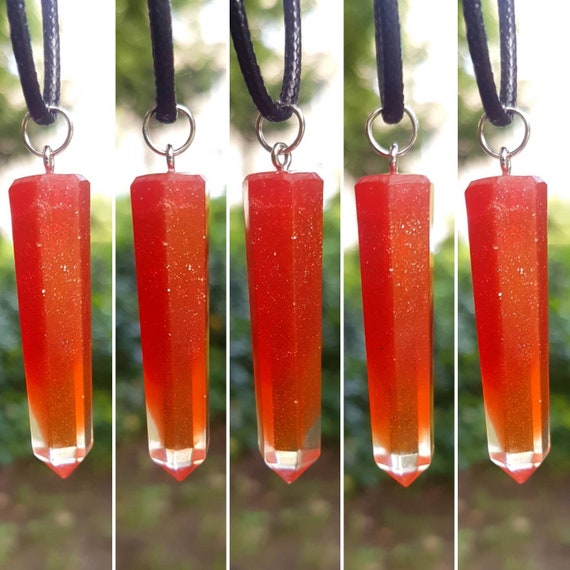Necklace with pendant made of epoxy resin - metallic red with silver glitter merging into transparent - stalactite shape