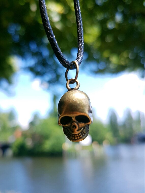 Black chain with small bronze skull