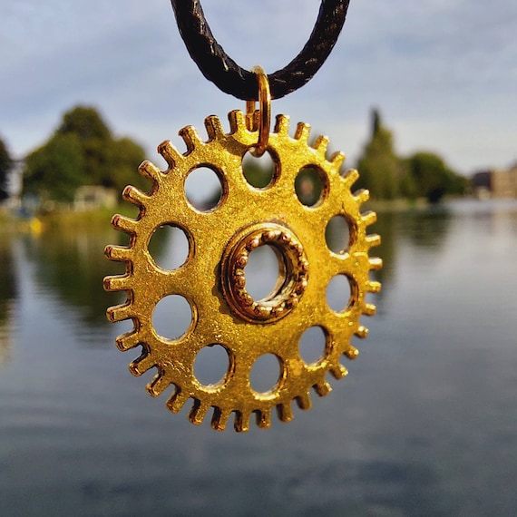 Black chain with golden gear