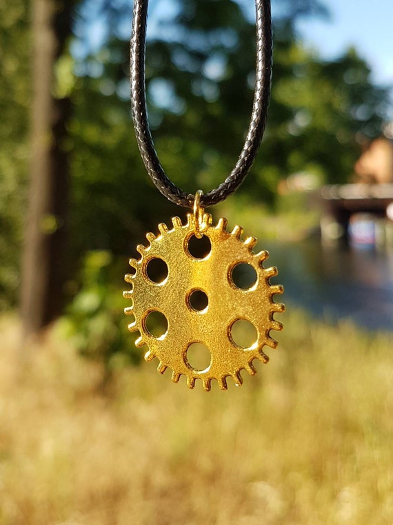Black necklace with gold-colored pendant - Steampunk gear