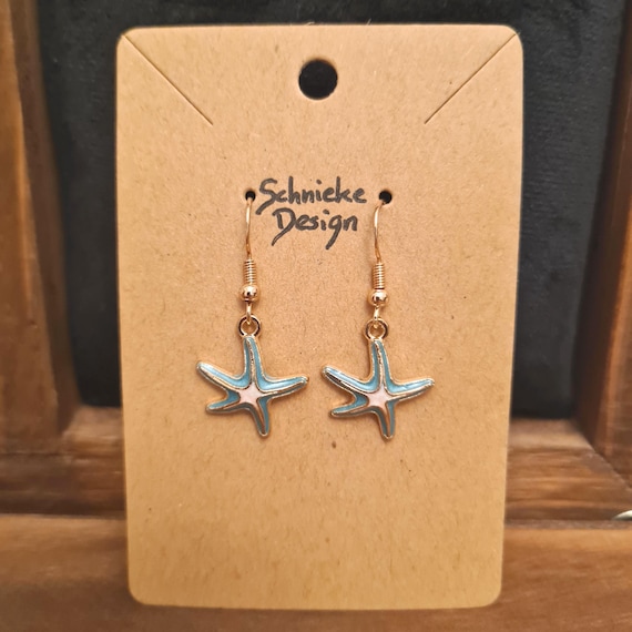 Earrings with light blue enamel starfish
