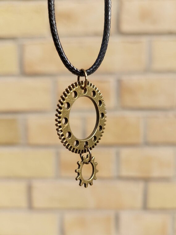 Black chain with two bronze gears