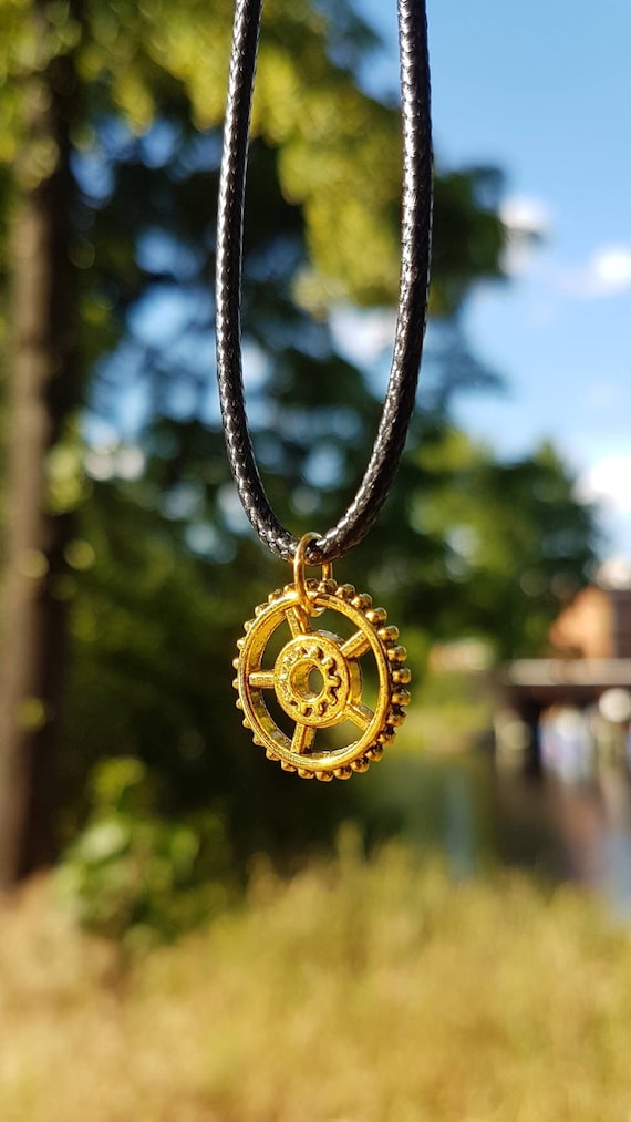 Black necklace with gold-colored pendant - Steampunk gear