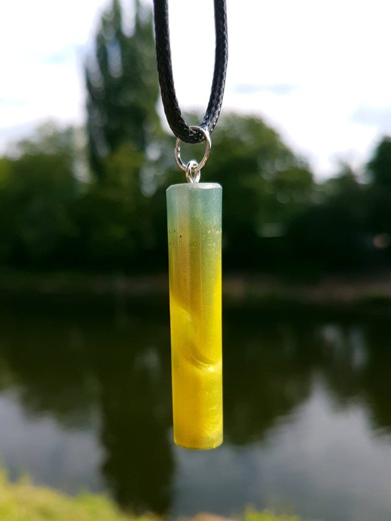 Necklace with pendant made of epoxy resin - metallic yellow dynamic - cylinder shape