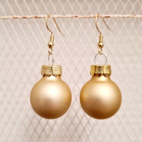 Christmas earrings with champagne-colored balls