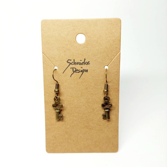 Earrings in bronze with mini key