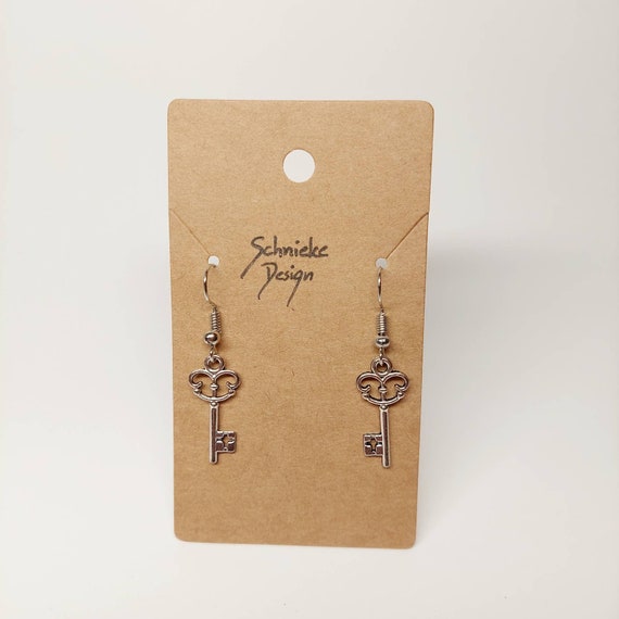 Earrings with small keys in silver