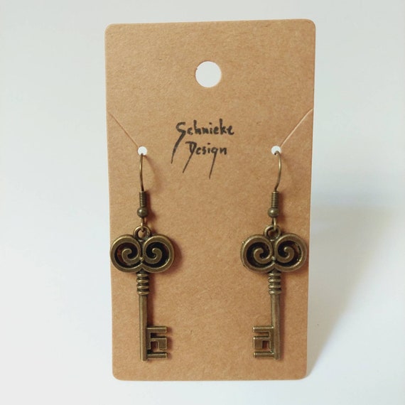 Earrings with keys in antikbronze