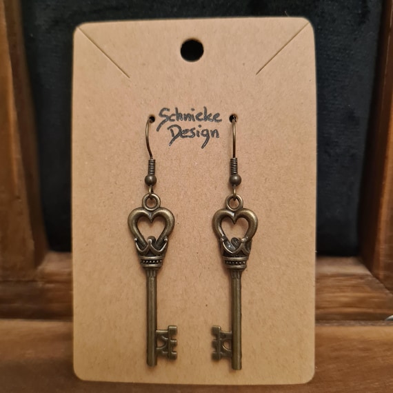Earrings with keys in antique bronze