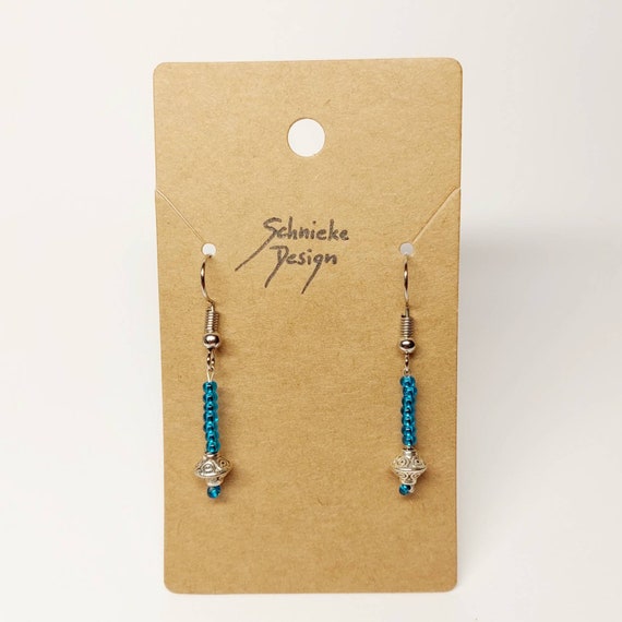 Earrings made of colorful and silver pearls
