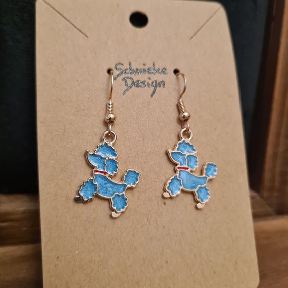 Earrings with cute blue enamel poodles