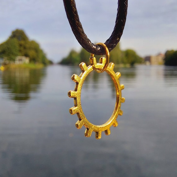 Black chain with gold gear