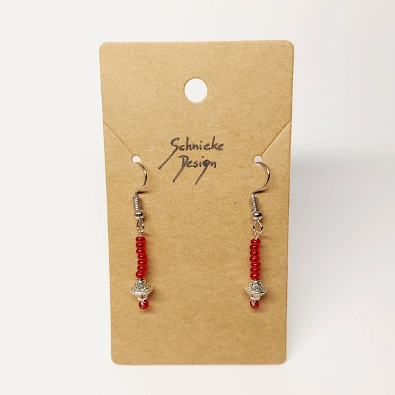 Earrings made of red and silver beads