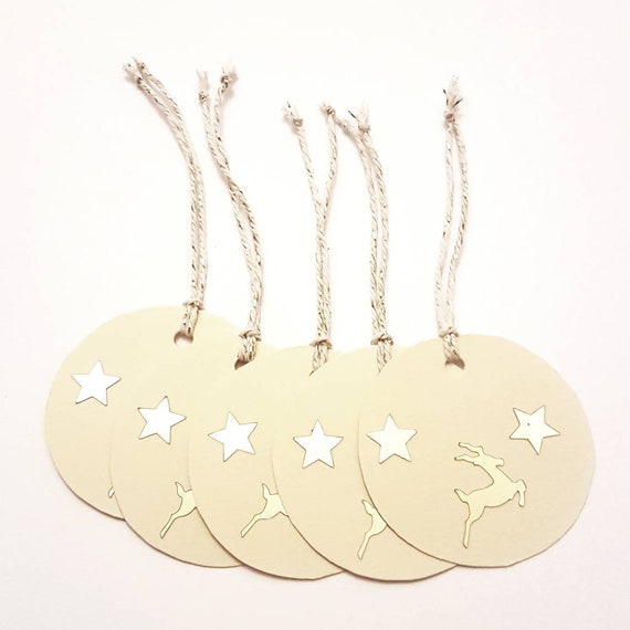Cream gift tags with golden reindeer and stars for your Christmas gifts