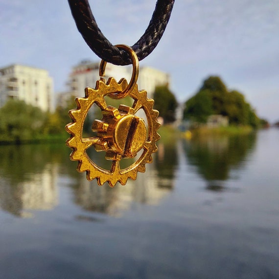 Black chain with golden gear