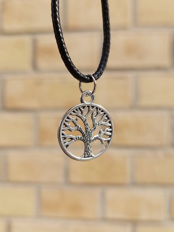 Black necklace with silver tree of life as pendant