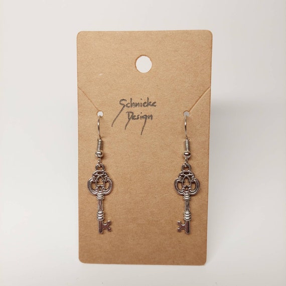 Earrings with small keys in silver