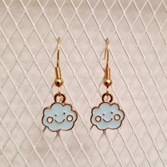 Earrings with small laughing clouds made of enamel