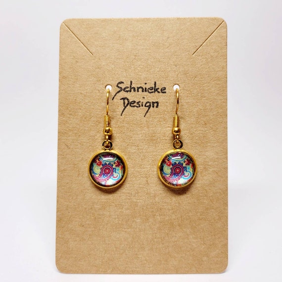 Earrings with round floral Zen cabochons