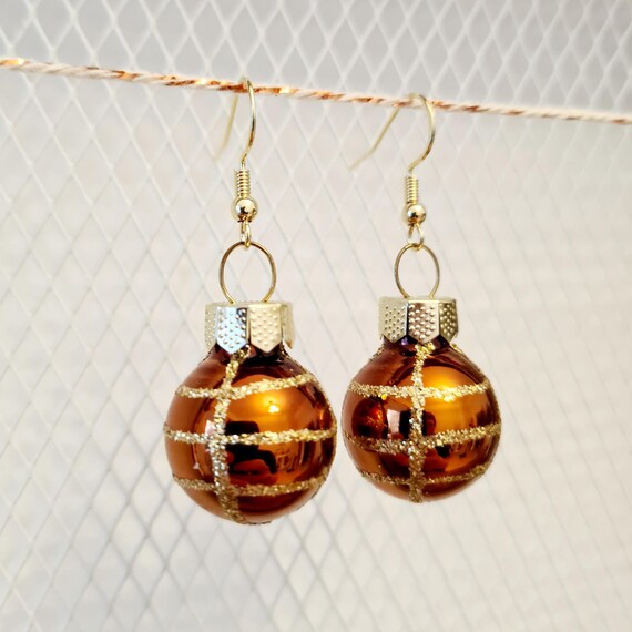 Christmas earrings with brown balls and glitter :)