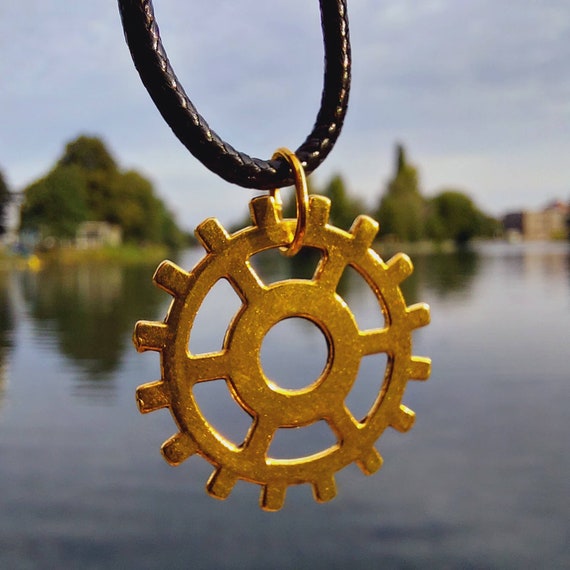 Black chain with golden gear