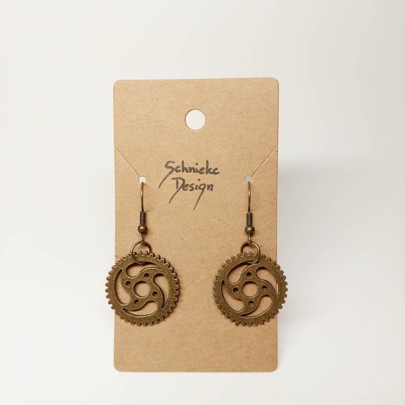Earrings with large gears in bronze