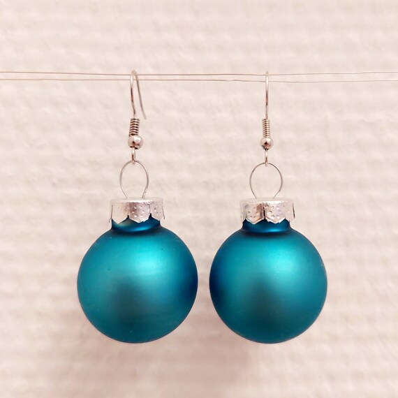 Christmas earrings with light blue balls