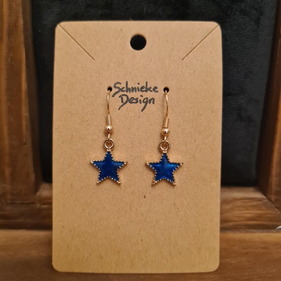 Earrings with small enamel stars