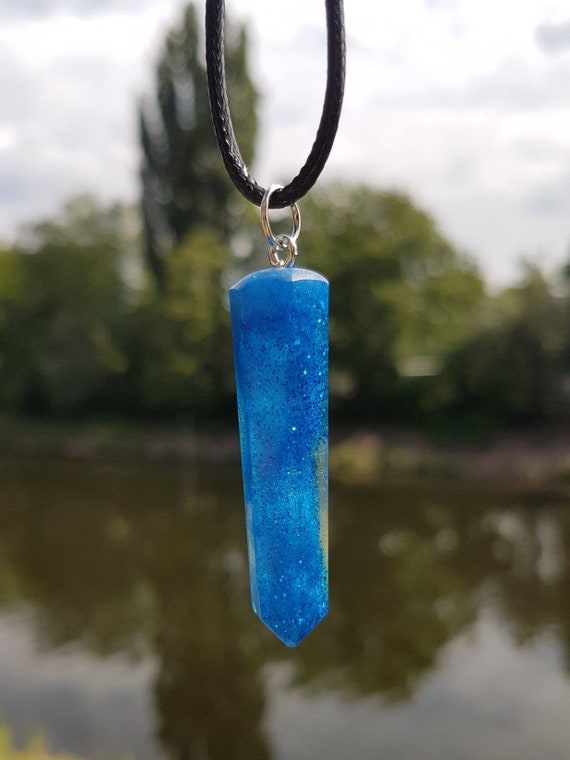 Necklace with handmade pendant made of epoxy resin - glitter swirl in metallic blue in transparent epoxy - form stalactite