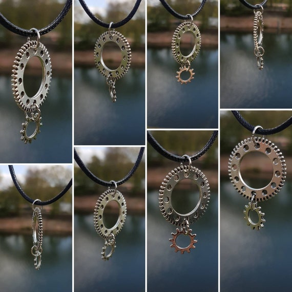 Black chain with silver pendant - large gear with small appendage
