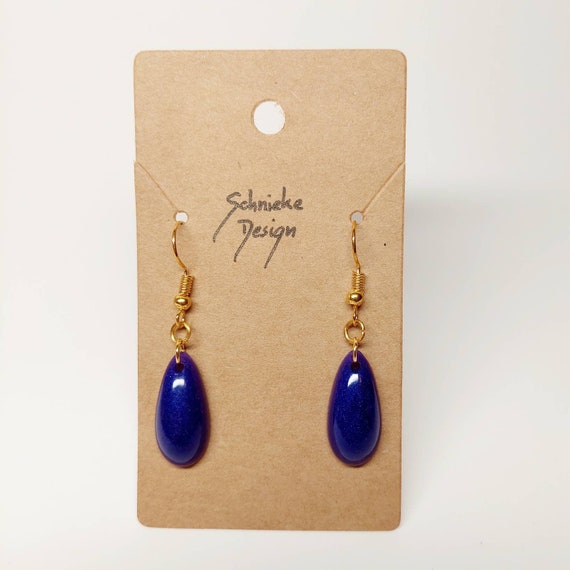 Drop-shaped earrings made of epoxy resin in metallic purple