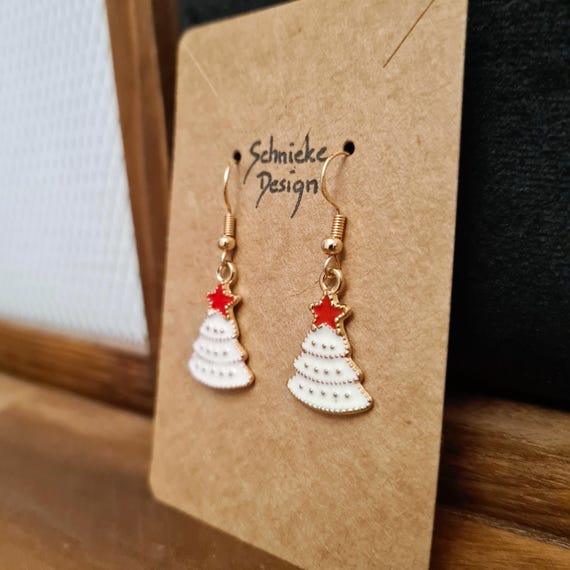 Earrings with a snow-covered Christmas tree