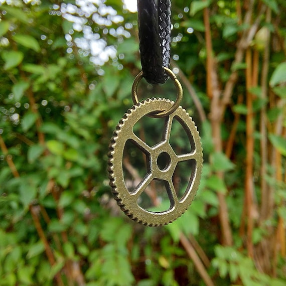 Black chain with bronze gear