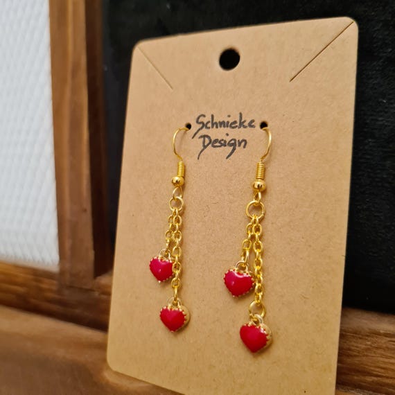 Earrings with small hearts on gold chains - short