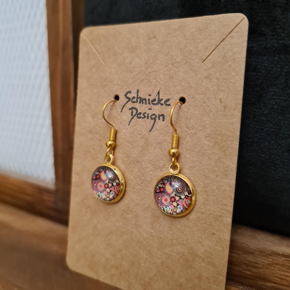 Earrings with round floral Zen cabochons