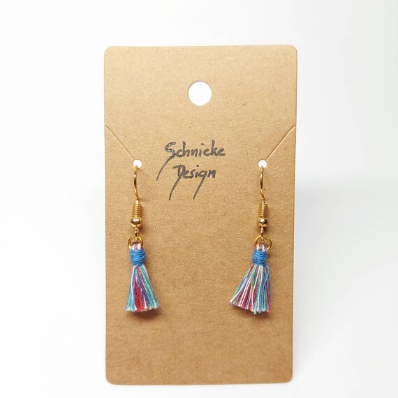 Earrings with small colorful tassels