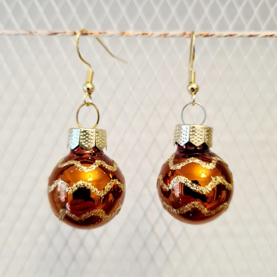Christmas earrings with brown balls and glitter :)