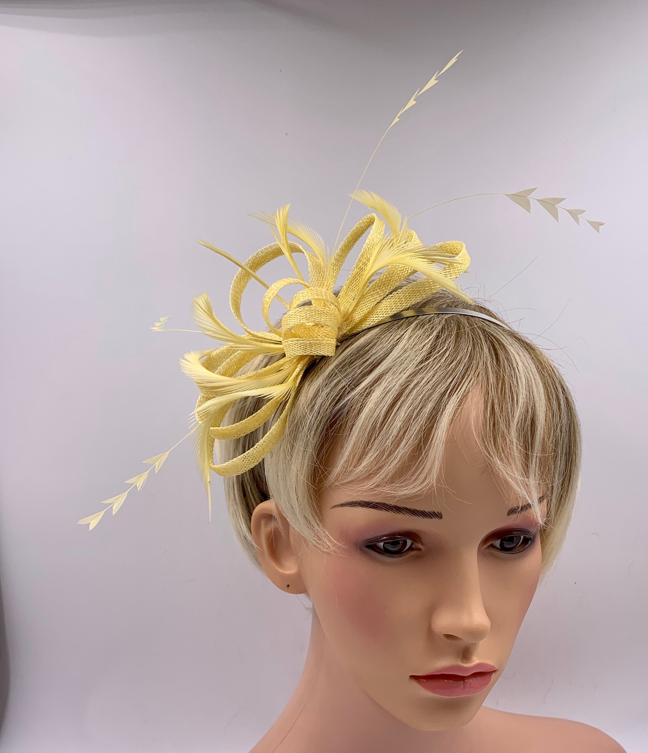 Small yellow fascinator Clearance