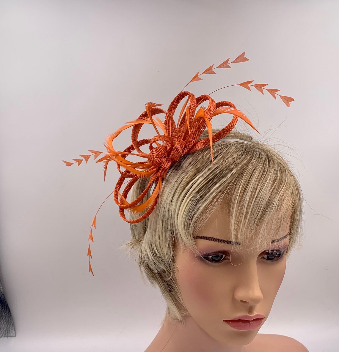 Burnt orange feather fascinator for weddings deep orange Etsy
