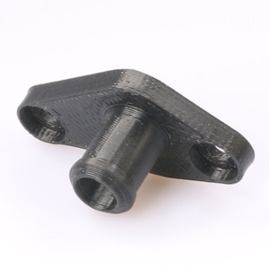 May include: Black plastic plumbing fitting with two round holes and a threaded pipe connection.