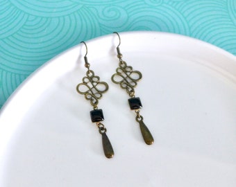 Graphic bronze and black enamel earrings, ethnic arabesque earrings, bronze and black intertwined earrings