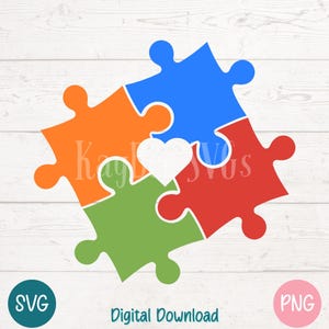 May include: Four puzzle pieces, each a different color, fit together to form a heart shape. The pieces are blue, orange, green, and red. The heart is white.