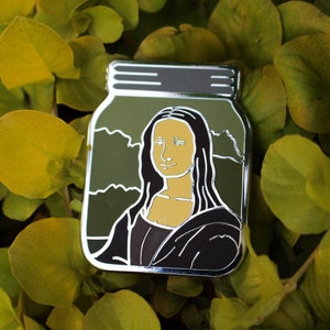 Mona Lisa in a Jar Enamel Pin