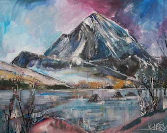 May include: A painting of a mountain range with a lake in the foreground. The sky is a mix of blue, purple, and pink. The mountain is a dark gray with white snow on top. The lake is a light blue with a few rocks in the water.