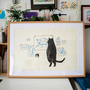 Cat gallery A2 Risograph poster |  Illustration in black and cornflower blue of a cat judging minimalistic cat art