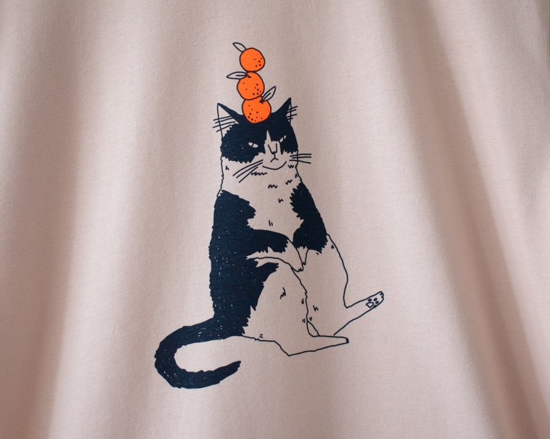 Orange Cat t-shirt Hand screen printed illustration of a cat balancing oranges on misty pink organic cotton tee with navy and orange image 2