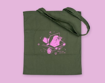 Looking for fucks to give cat tote bag | Hand screen printed olive green cotton tote bag with pink illustration of a cat with binoculars